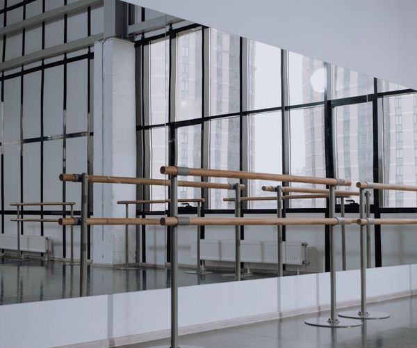 Bright and modern studio space with large windows.